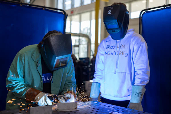 Student observing welding
