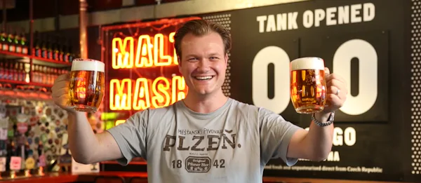 Alex Weschta holding beer